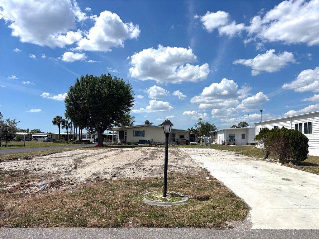 Photo of 256 El Prado Ave, North Port, FL 34287 (MLS # TB8317899)