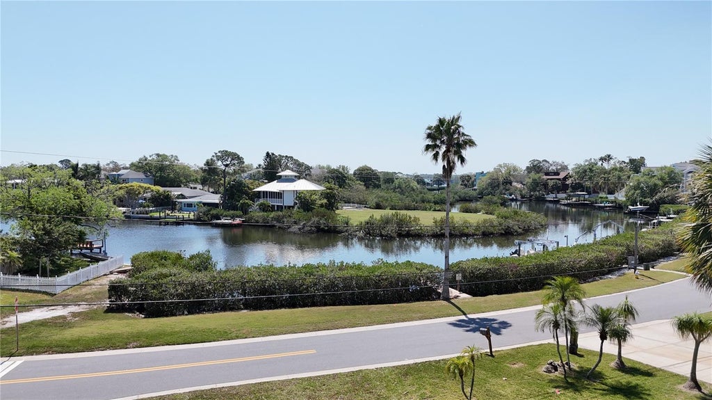 Photo of 231 Lagoon Drive, Palm Harbor, FL 34683 (MLS # TB8490521)