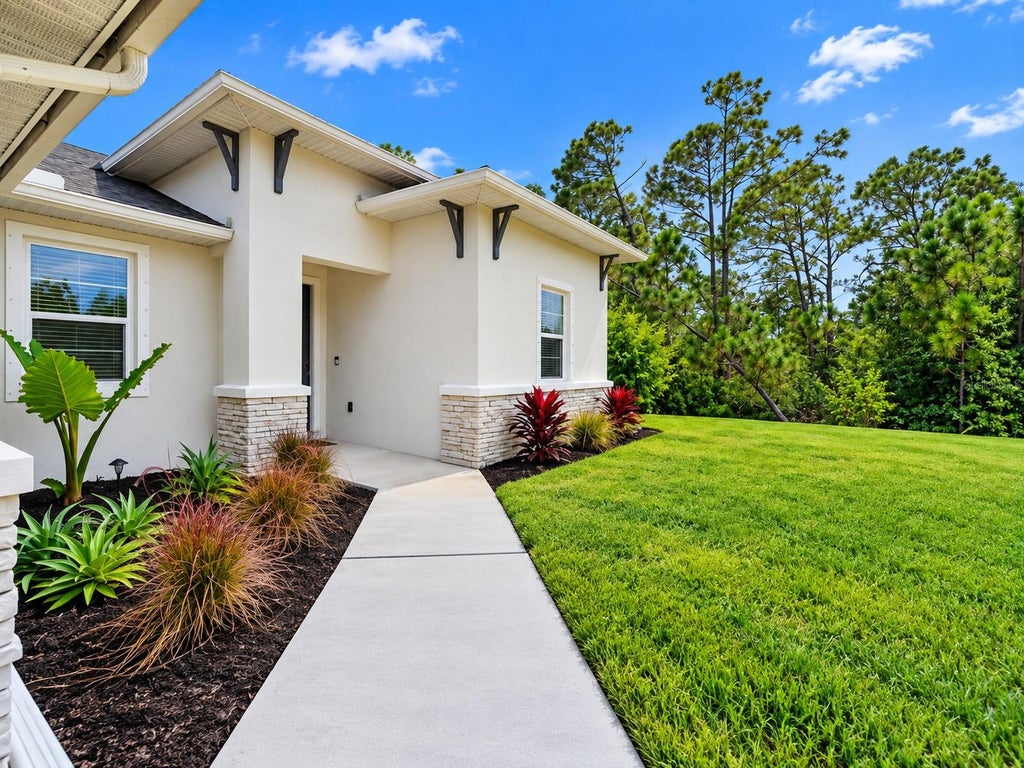 Photo of 1898 Ponce De Leon Boulevard, North Port, FL 34291 (MLS # A4708433)