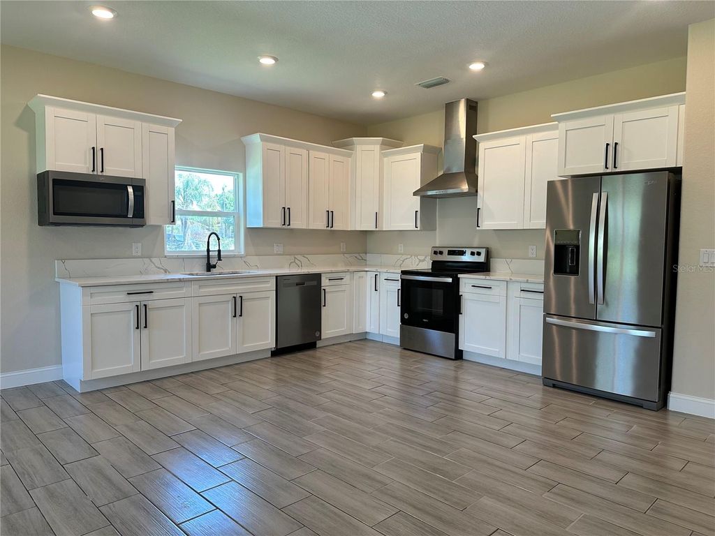 Photo of 1404 Lowry Avenue E, Haines City, FL 33844 (MLS # TB8499777)