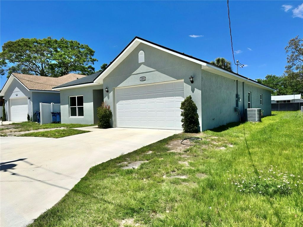 Photo of 1404 Lowry Avenue E, Haines City, FL 33844 (MLS # TB8499777)