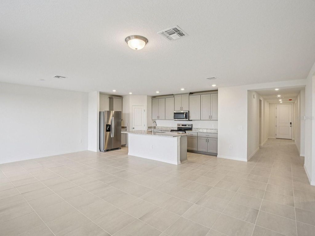 Photo of 823 Sunshower Drive, Lady Lake, FL 32159 (MLS # TB8510554)