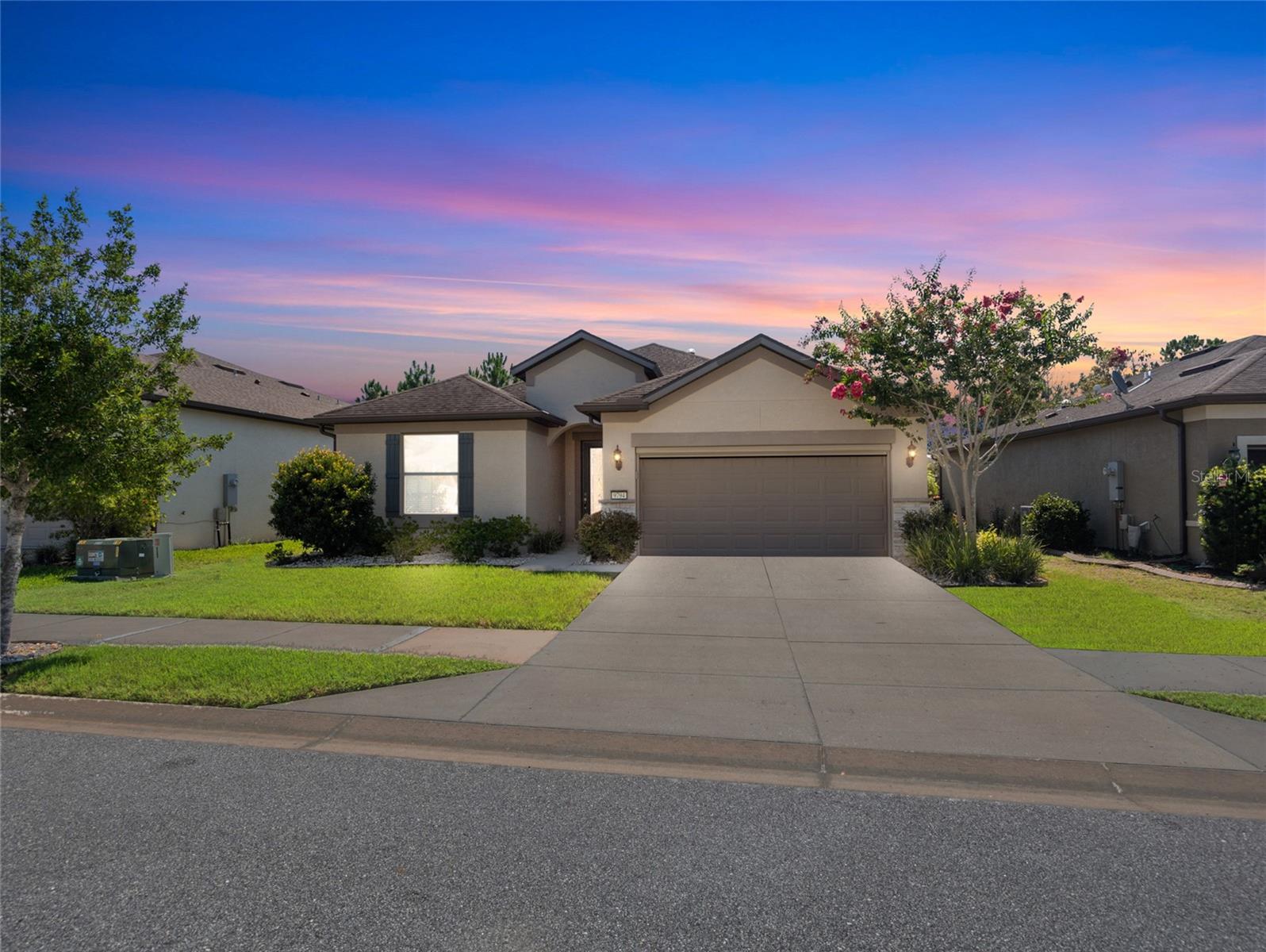 Welcome to this beautifully upgraded Summerwood model located in the highly sought-after Del Webb Stone Creek, one of Ocala’s premier 55+ communities. This 3-bedroom, 2-bathroom home also includes a versatile flex room with a custom built-in desk—ideal for a home office, hobby space, or reading retreat.
The gourmet kitchen is a chef’s delight, featuring granite countertops, pendant lighting, crown molding on the cabinets, and an open-concept design that’s perfect for entertaining. The main living areas feature easy-care laminate wood plank flooring, combining style with practicality. The spacious laundry room offers a large stainless steel sink, quartz countertops, and extra cabinetry for optimal function and storage.
The primary bathroom also includes beautiful quartz countertops and a thoughtfully designed drop zone to help keep daily essentials organized.
Step outside to your private, fenced-in backyard oasis, where a paver patio and low-maintenance white river rock accents both the front and side yards—creating a clean and cohesive outdoor space. This energy-efficient home includes solar panels with battery backup—helping to lower utility costs and providing added peace of mind.
Additional upgrades include an electric garage screen, decorative glass front door, solar tubes for natural light, and an attic solar fan for enhanced ventilation.
Meticulously maintained and move-in ready, this home blends comfort, style, and sustainability—all within a vibrant, amenity-rich community.