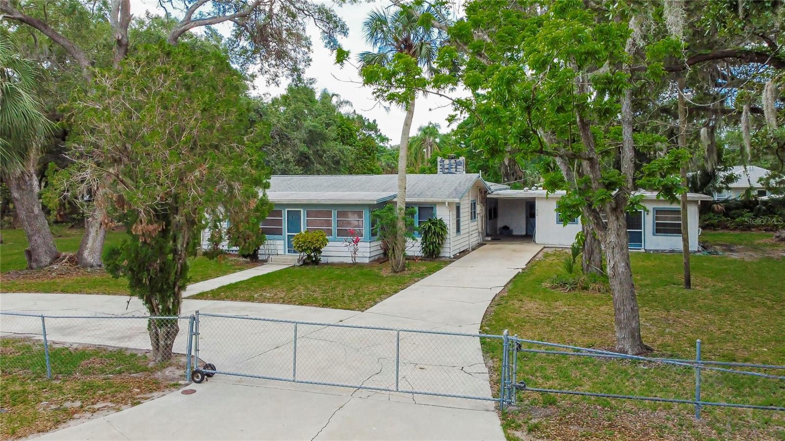 Charming Country Living on Spacious Property – Perfect for Investors! Nestled just behind the Ringling School of Art’s Sound Stage, this unique property offers the perfect blend of country living with the convenience of city access. Zoned RF3, it’s an investor’s dream with incredible potential! Whether you're looking to renovate or build, the possibilities are endless. Don’t miss the chance to see this prime piece of real estate – schedule a tour today!