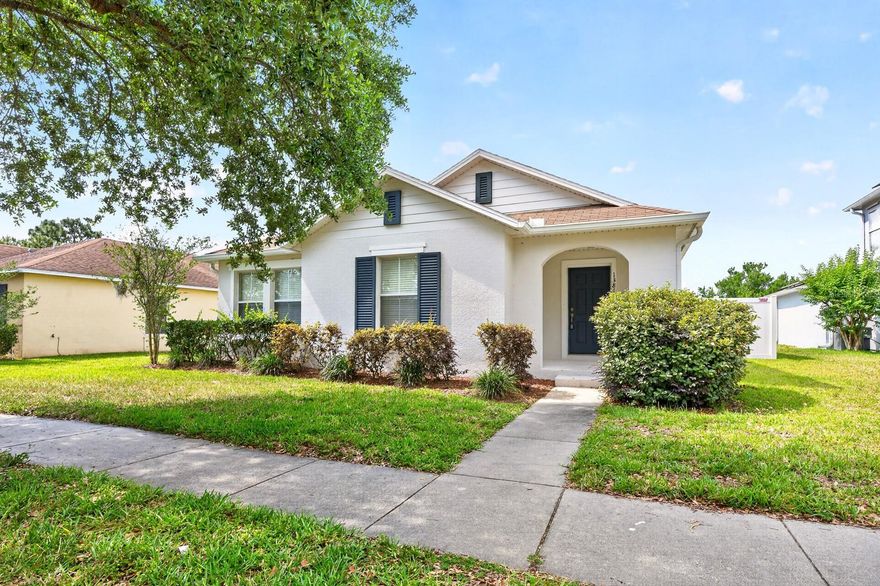 One or more photo(s) has been virtually staged. Welcome to this BEAUTIFULLY MAINTAINED 3-bedroom, 2-bath single-story home in the highly desirable Avalon Park Northwest Village, where CHARMING CURB APPEAL, modern updates, and an unbeatable community atmosphere come together perfectly. Located in a TOP-RATED SCHOOL DISTRICT, this home provides the perfect combination of comfort, convenience, and lifestyle. A welcoming front porch sets the tone as you step inside to discover LUXURY VINYL PLANK FLOORING throughout the home, creating a stylish and cohesive feel. The SPACIOUS Living Room offers plenty of room to relax or entertain, while the SUNLIT Dining area just off the Kitchen creates a warm and inviting space for everyday meals and gatherings. The Kitchen is thoughtfully designed with AMPLE CABINETRY and COUNTER SPACE, a pantry closet, and a breakfast bar, making both cooking and entertaining effortless. Sliding glass doors from the Dining area open to the COVERED OUTDOOR PATIO and spacious backyard, fully enclosed with a VINYL FENCE for added privacy—perfect for outdoor dining, pets, or weekend get-togethers. The Primary Suite offers a peaceful retreat, filled with NATURAL LIGHT and featuring a walk-in closet and EN SUITE BATH with dual sinks, a garden tub, and a step-in shower. Two additional bedrooms and a second full bath provide flexibility for family, guests, or a home office. ADDITIONAL UPDATES include a NEW AC (2026) and FRESH EXTERIOR PAINT  (2021), offering added peace of mind. The rear-entry garage enhances both functionality and curb appeal while maintaining the CHARMING STREETSCAPE Avalon Park is known for. An added bonus, this home offers EXCELLENT RENTAL POTENTIAL, making it a wonderful opportunity for both homeowners and investors seeking a property in a highly desirable Avalon Park location. Residents enjoy access to WONDERFUL COMMUNITY AMENITIES, including parks, community pools, playgrounds, walking and biking trails, sports courts, and COMMUNITY EVENTS throughout the year. CONVENIENTLY LOCATED near the heart of Avalon Park, you’ll love being close to local restaurants, boutique shopping, coffee shops, and seasonal festivals that give the area its SMALL-TOWN CHARM.The home is also just minutes from UNIVERSITY OF CENTRAL FLORIDA, as well as shopping and entertainment destinations like WATERFORD LAKES TOWN CENTER. With its inviting layout, tasteful updates, and location in one of East Orlando’s MOST SOUGHT-AFTER COMMUNITIES, this Avalon Park home offers the perfect opportunity to enjoy the very best of Central Florida living. Call and schedule your showing today!