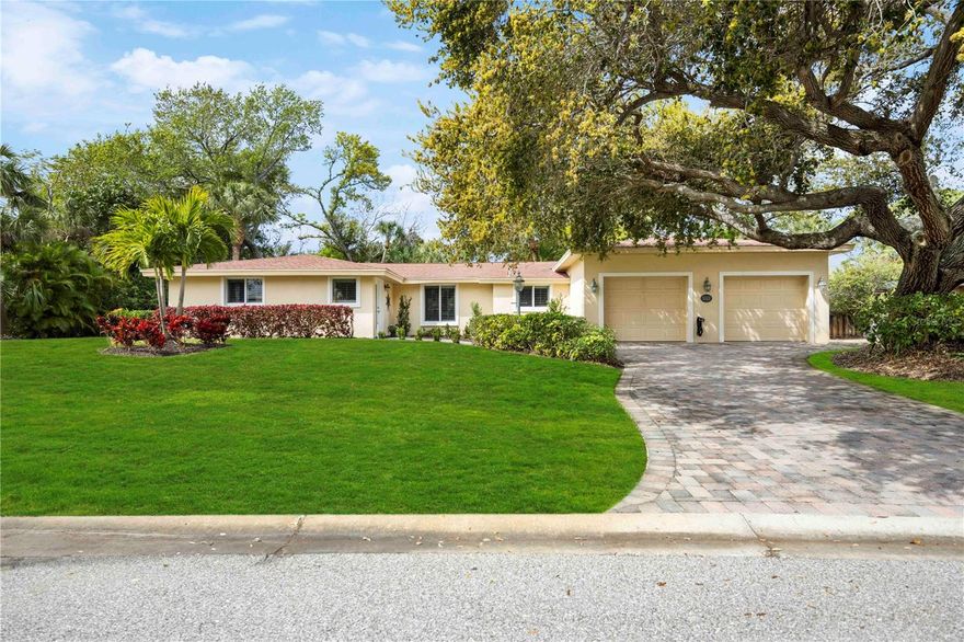 Nestled in the heart of picturesque Siesta Key, this stunning turnkey 3-bedroom, 3-bathroom single-family home offers the perfect blend of luxury, comfort, and convenience. As you step inside, you're greeted by an expansive open concept living area, complete with vaulted ceilings that enhance the sense of space and elegance. Natural light floods through large windows, creating a warm and welcoming atmosphere that is perfect for both relaxation and entertaining.  The home boasts a spacious primary suite, designed for ultimate comfort and privacy, featuring an en-suite bathroom that promises a tranquil retreat from the hustle and bustle of daily life. A second bedroom also includes an en-suite, offering guests or family members their own private space.  The kitchen opens seamlessly to the living and dining areas, ensuring that whether you're cooking up a storm or hosting a gathering, you're always part of the action.  With ample storage, and sleek countertops make this kitchen a chef's dream.  Step outside to the backyard oasis, where a sparkling pool awaits, complete with a mesmerizing water feature that adds a touch of serenity. The pool area is the perfect spot for soaking up the Florida sun, hosting barbecues, or simply enjoying a quiet evening under the stars.  For those who require a bit more space, the oversized two-car garage offers ample room for vehicles and storage, ensuring that your space remains clutter-free. Situated just a 1/4 of a mile from the world-renowned Siesta Key Beach, this home places you minutes away from pristine white sand beaches and crystal-clear waters. The Village of Siesta Key, with its charming shops, restaurants, and entertainment options, is only 3/4 of a mile away, making it easy to enjoy the best of what Siesta Key has to offer.  This property is not only a luxurious residence but also a proven investment, boasting a great rental history. Whether you're looking for a permanent home, a vacation getaway, or a lucrative rental property, this home on Siesta Key offers it all.