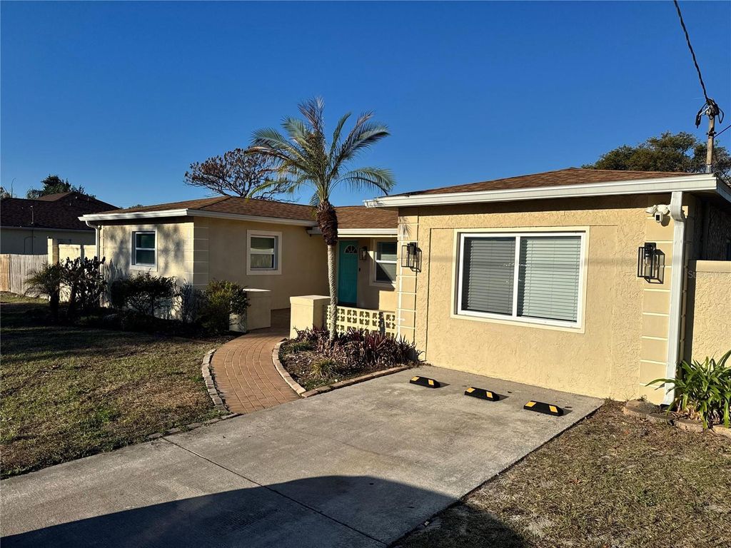 Photo of 9812 N Oklawaha Avenue, Tampa, FL 33617 (MLS # TB8480171)