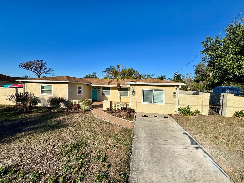 Photo of 9812 N Oklawaha Avenue, Tampa, FL 33617 (MLS # TB8480171)