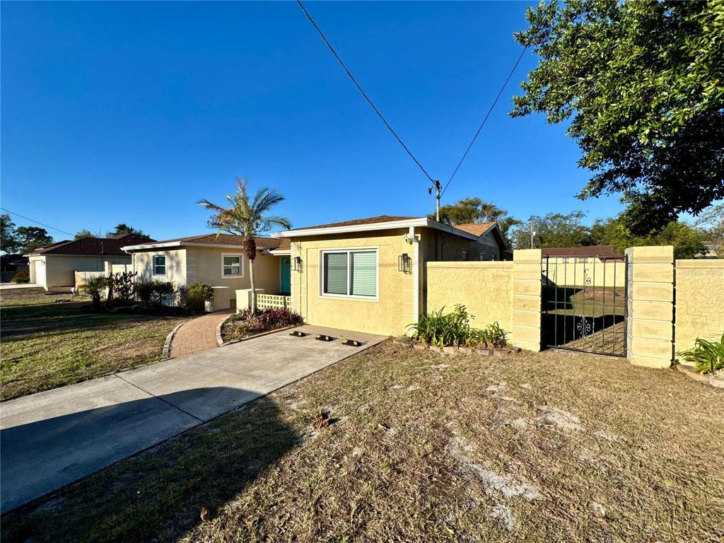 Photo of 9812 N Oklawaha Avenue, Tampa, FL 33617 (MLS # TB8480171)