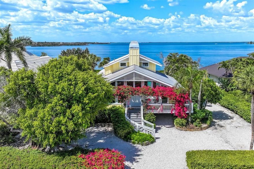 Experience waterfront living in this recently updated Boca Grande residence, ideally positioned along the serene shores of Gasparilla Sound. This four-bedroom, four-bath pool home  blends timeless coastal charm with thoughtful modern upgrades, starting with its inviting curb appeal and welcoming entry.
Inside,  elegant shiplap detailing enhances the interior walls, adding warmth and character throughout. The home features an updated kitchen and breakfast room with stunning water views. The second-floor primary suite serves as a private retreat, complete with a updated bath and its own waterfront deck. Three additional bedrooms, two en suite, offer private entrances off the pool, creating a perfect setup for guests or extended family.  Storm-resistant doors and windows flood the home with natural light while providing peace of mind and added protection.
Step outside to embrace the ultimate waterfront lifestyle. The expansive pool area overlooks the water, complemented by a private boardwalk and dock—ideal for kayaks, paddleboards, fishing, or simply enjoying breathtaking sunsets.
This exceptional property is a perfect opportunity to own an island home in Boca Grande —where comfort, and coastal beauty come together seamlessly.