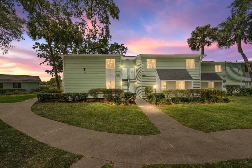 Welcome home to a two-bedroom, one-and-a-half-bath condominium in the lovely Live Oak Village, a 55-plus community in Ocala, Florida. This second-floor residence offers unobstructed views of Lake Sparkle and is a short walk to the pool and clubhouse. Brand new carpet has just been installed throughout, and the unit is furnished and ready for you to move in and enjoy. The HOA fees cover essential amenities, including basic cable, insurance, maintenance of the building and common areas, garbage pickup, and access to the community pool and clubhouse. Grocery stores, pharmacies, local restaurants, and hiking trails are all within minutes. The streets are lined with beautiful oak trees providing plenty of shade for daily walks. The grounds are well-lit at night, and this community experiences minimal traffic due to its location on a dead-end road. Ready for immediate occupancy.