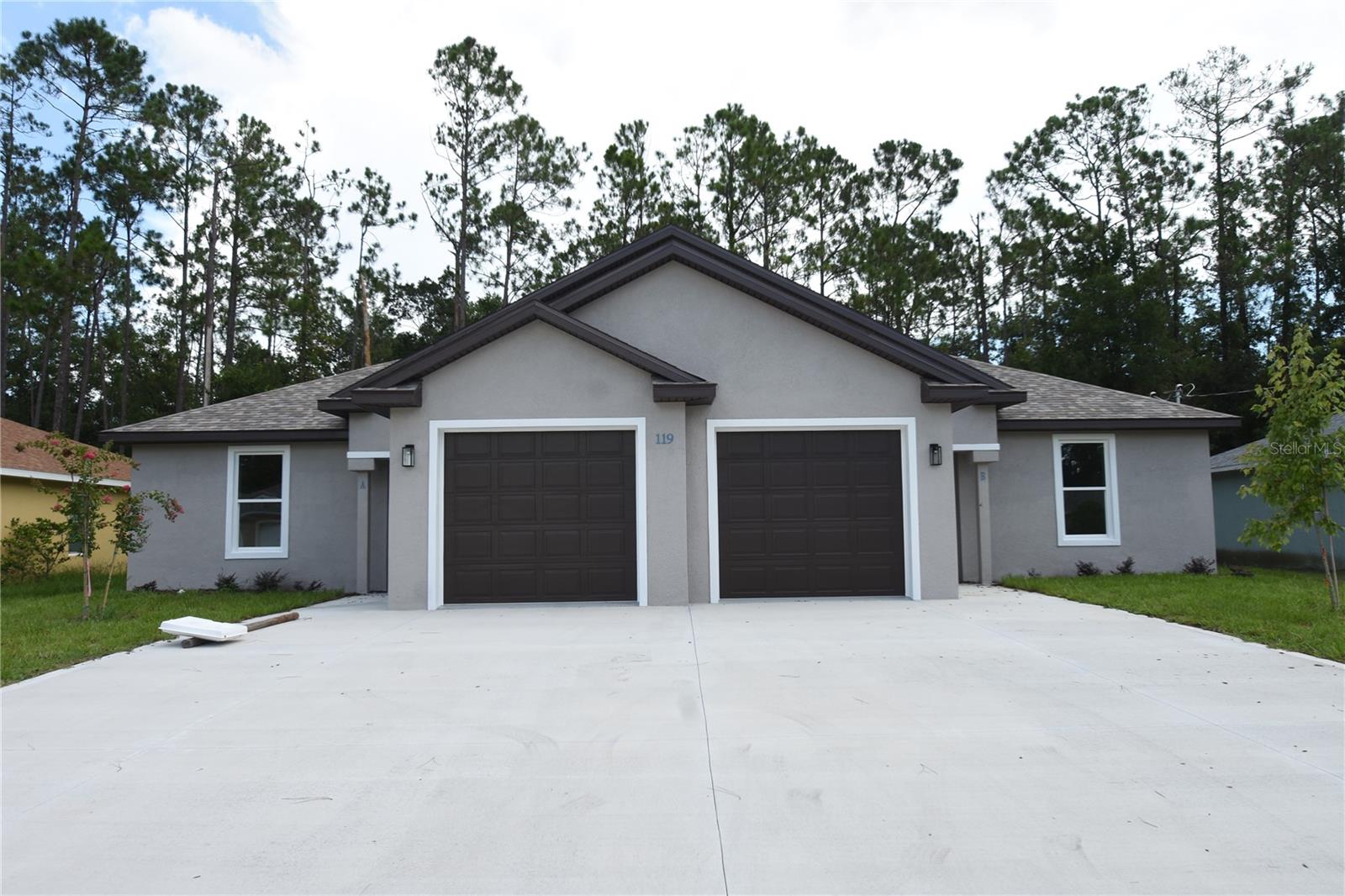 Deposit free living (for qualified renters through Obligo). Welcome to 119 Wellwood Lane, Unit A, a gem nestled in the heart of Palm Coast, FL, where comfort meets elegance. This stunning duplex offers three spacious bedrooms and two full baths, providing ample space for relaxation and daily living. Spanning 1,336 square feet, this beautiful home is designed with meticulous attention to detail. Step into the modern kitchen, where sleek granite countertops invite you to unleash your culinary creativity. The open-concept living area radiates warmth and style, making it perfect for entertaining friends or enjoying a quiet evening. Large windows throughout fill each room with abundant natural light, creating a bright and welcoming atmosphere. Imagine starting your day with a cup of coffee on your private patio, basking in the tranquility of the surrounding neighborhood. Situated close to local amenities and scenic parks, this location offers the perfect balance of convenience and serenity. Experience the charm and comfort of Palm Coast living at its finest in this inviting and well-appointed duplex. Whether you're looking for a forever home or a seasonal retreat, 119 Wellwood Lane, Unit A, is the perfect place to create lasting memories. Learn more about the benefits of deposit-free living here:
See the Obligo brochure https://depositfree.myobligo.com/hubfs/Partner%20Resource%20Center%20(Obligo%20x%20Buildium)/Tenant%20Brochure.pdf