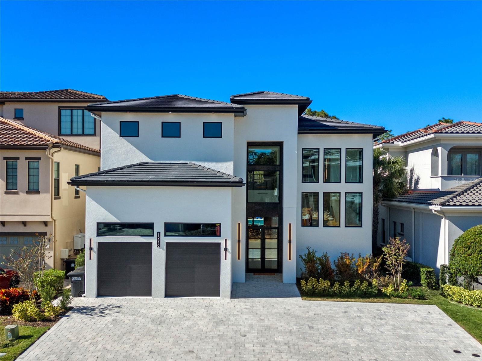 Under contract-accepting backup offers. Investment Opportunity: Luxury 9-Bedroom Estate in Reunion Resort
Introducing the "Luxe Retreat," a premier nine-bedroom luxury villa strategically situated within the highly sought-after Reunion Resort. This expansive estate presents a compelling opportunity for investors seeking a turnkey short-term rental asset with strong appeal to high-end vacationers.
Constructed with premium finishes and modern design, the property offers a spacious and versatile layout, ideal for accommodating large groups and families. The open-concept living spaces feature soaring ceilings, abundant natural light, and high-end furnishings, creating an inviting atmosphere that maximizes guest comfort and satisfaction. Each uniquely crafted bedroom has its own en-suite bathroom for privacy.
The gourmet kitchen is equipped with state-of-the-art appliances, quartz countertops, and custom cabinetry, providing a premium experience for guests and ease of management for owners. The home includes nine full bathrooms and three half-baths, ensuring convenience and privacy for large groups.
Unique to this estate are three creatively themed bedrooms—designed to enhance guest appeal and boost rental occupancy. These custom-built rooms serve as standout amenities, increasing the property's attractiveness in a competitive vacation rental market. There are likewise many aesthetic vantage points for all your social media posting moments.
Entertainment features include a game room with arcade and basketball court with 16 foot ceilings, a hidden game room, a private theater with plush reclining seating and a large screen, and a high-tech golf simulator—adding value and appeal to short-term rental offerings. Outdoor amenities include a private pool with dual sun decks, and a cozy outdoor fire pit, creating multiple opportunities for leisure, entertainment and social media moment spots.
Located within Reunion Resort, the property benefits from access to world-class amenities such as championship golf courses, resort pools, dining, water parks, and spa facilities. Its proximity to Orlando’s major attractions—including Disney World—further enhances its rental potential.
This estate represents a lucrative investment in the thriving vacation rental market, offering strong income opportunities, high-end amenities, and a prime location in one of Florida’s most desirable resort communities. Whether as a short-term rental, a second home, or a portfolio addition, Luxe Retreat delivers exceptional value and growth potential.
