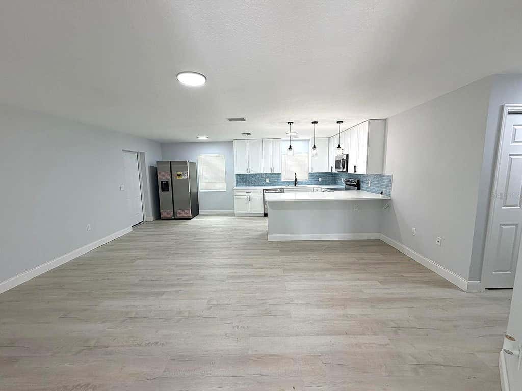 Photo of 445 NW 10th Avenue, Webster, FL 33597 (MLS # O6431361)