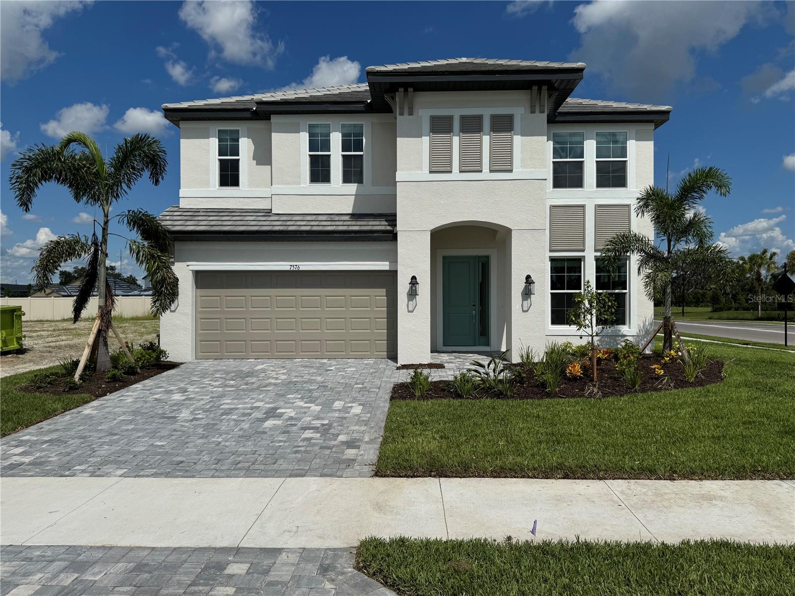 The highly sought-after gated community of Hawkstone! ****$20,000 off Closing Costs, SPECIAL FINANCING AVAILABLE FOR A LIMITED TIME ONLY FROM PREFERRED LENDER. RESTRICTIONS APPLY, FOR QUALIFIED BUYERS, SUBJECT TO APPLICABLE TERMS AND CONDITIONS. SUBJECT TO CHANGE WITHOUT NOTICE****This expansive two-story Wekiva floor plan offers 5 bedrooms, 4 full bathrooms, a flex room, bonus room, and a 3-car tandem garage. Step into the grand foyer, where a versatile flex room awaits. A spacious utility room provides ample storage and organization, while the heart of the home opens into a stunning gourmet kitchen with elegant cabinetry, an oversized island with seating, and a walk-in pantry. The kitchen flows seamlessly into a bright breakfast nook and an impressive great room with two sets of sliding glass doors leading to the covered lanai, ideal for indoor-outdoor living. A first-floor guest suite and pool bath make entertaining easy. Upstairs, retreat to the luxurious owner’s suite, complete with abundant natural light, dual vanities, an enclosed shower, water closet, and a massive walk-in closet. Three additional bedrooms and a large bonus room provide the perfect space for family, guests, or entertainment. Hawkstone offers the ultimate in Florida living, gated community, low HOA that includes lawn maintenance, and convenience, just minutes from Sarasota’s world-renowned beaches, fine dining, shopping, and top-rated schools.