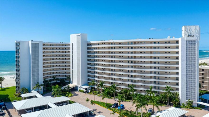 AMAZING FULL GULF AND BEACH VIEWS! On entering this unit your attention is immediately drawn to the stunning view of the beach with the glistening crystal blue waters of the Gulf. The fine powdery quartz sands are only steps away for you to enjoy. This beautiful bright and airy condominium is being sold TURNKEY FURNISHED and has been tastefully renovated. The kitchen with stainless steel appliances, maple wood cabinets with coffee glaze and granite counters is open to the dining and living area. This unit has hurricane rated windows and sliders, Bamboo floors, crown molding and plantation shutters with a desirable split bedroom floorplan. There are custom fitted closets in both bedrooms and the guest bedroom has additional built-in cabinets and drawers. The wall-to-wall impact sliding glass doors in living room convey outdoor living at its finest. Step out onto the screened balcony from the living room and both bedrooms to relax and bask in the splendor of the sunsets each and every day. The bathrooms have been meticulously remodeled to enhance their function. The large laundry with tankless water heater, washer and dryer affords extra storage space. A HOME WARRANTY WILL BE PROVIDED AT CLOSING. This is a pet friendly complex and provides a true island paradise experience. Crystal Sands has undergone extensive renovations to ensure a modern and secure living environment. The entire building reflects a commitment to quality and longevity. From the new roofs on all structures, all sewage pipes throughout the high rise were replaced, reinforced balconies, new high-rise lanai railings and screens, new high-rise handrails on walkways, updated elevators, refreshed common areas and manicured landscaping.   Milestone Inspection and SIRS have been completed. Private deeded beach access, 2 community pools and BBQ area. This unit has been in the onsite rental program which offers 2-week minimum rentals. RENTAL HISTORY AVAILABLE. The free trolley stops right outside the resort and quickly takes you to the village for shopping and dining. Or walk to the south village next to Stickney Point to explore more shopping and restaurants. The heart of downtown Sarasota is a short drive where you can enjoy many theatre and entertainment options. This is a must see and an exciting opportunity for the next owner or investor. Don't wait! Schedule a showing today.