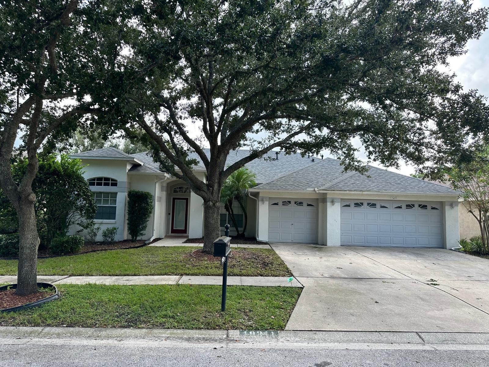 Discover 19211 Dove Creek Dr—a rare gem in the heart of New Tampa. This split single-level 4-bedroom, 3-bath pool home offers the perfect blend of privacy and open living, ideal for families or professionals seeking comfort and convenience. Zoned for A-rated schools—Clark Elementary, Liberty Middle, and Freedom High—this home sits in one of Tampa’s most desirable districts. You're just minutes from Tampa Premium Outlets, Wiregrass Mall, Publix, Walmart, and a vibrant mix of dining and entertainment. Inside, enjoy a spacious layout with tile and laminate flooring, a large spacious kitchen with stainless steel appliances, and a serene backyard with fruit trees. Tenants also get access to the resort-style clubhouse, complete with pools, tennis courts, a gym, and more. This is the only home one storey home currently available in the neighborhood—and it will go fast. Don’t miss your chance to live in one of Tampa’s most sought-after communities!