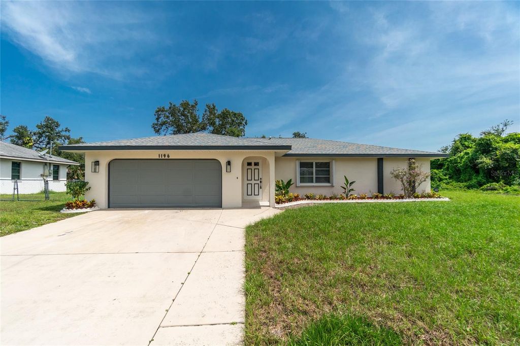 Photo of 1196 Ample Avenue, Port Charlotte, FL 33948 (MLS # D6146916)