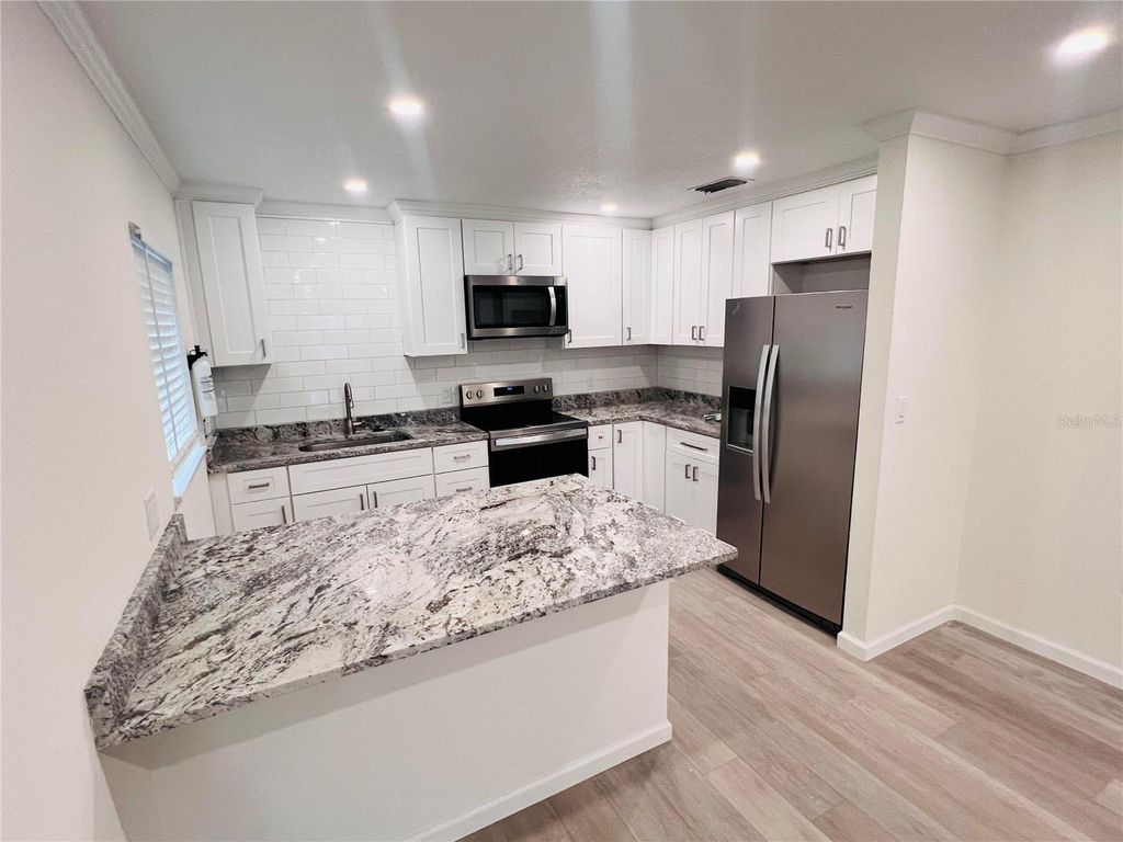 Photo of 5800 Virginia Avenue, New Port Richey, FL 34652 (MLS # W7885034)