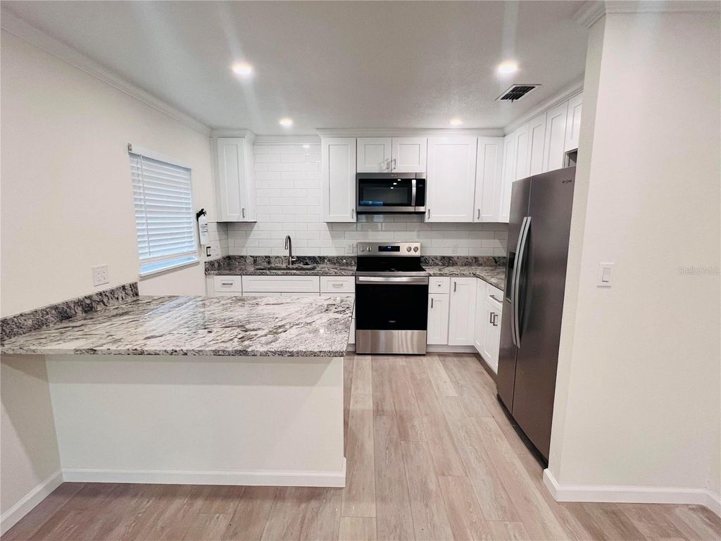 Photo of 5800 Virginia Avenue, New Port Richey, FL 34652 (MLS # W7885034)