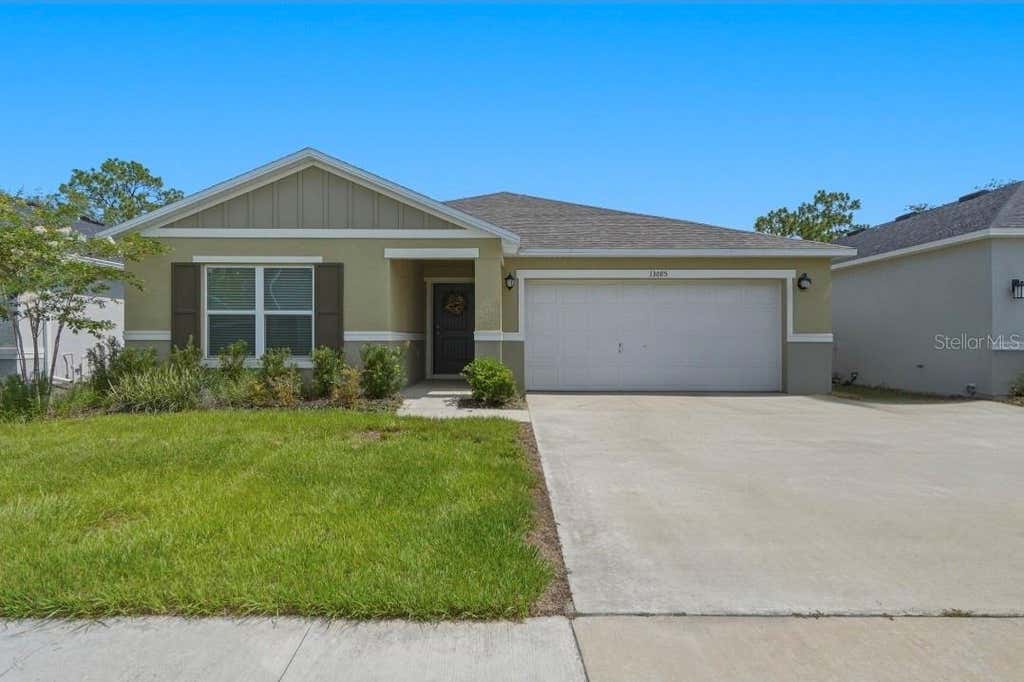 Photo of 13085 Thatch Palm Way, Orlando, FL 32828 (MLS # O6424963)