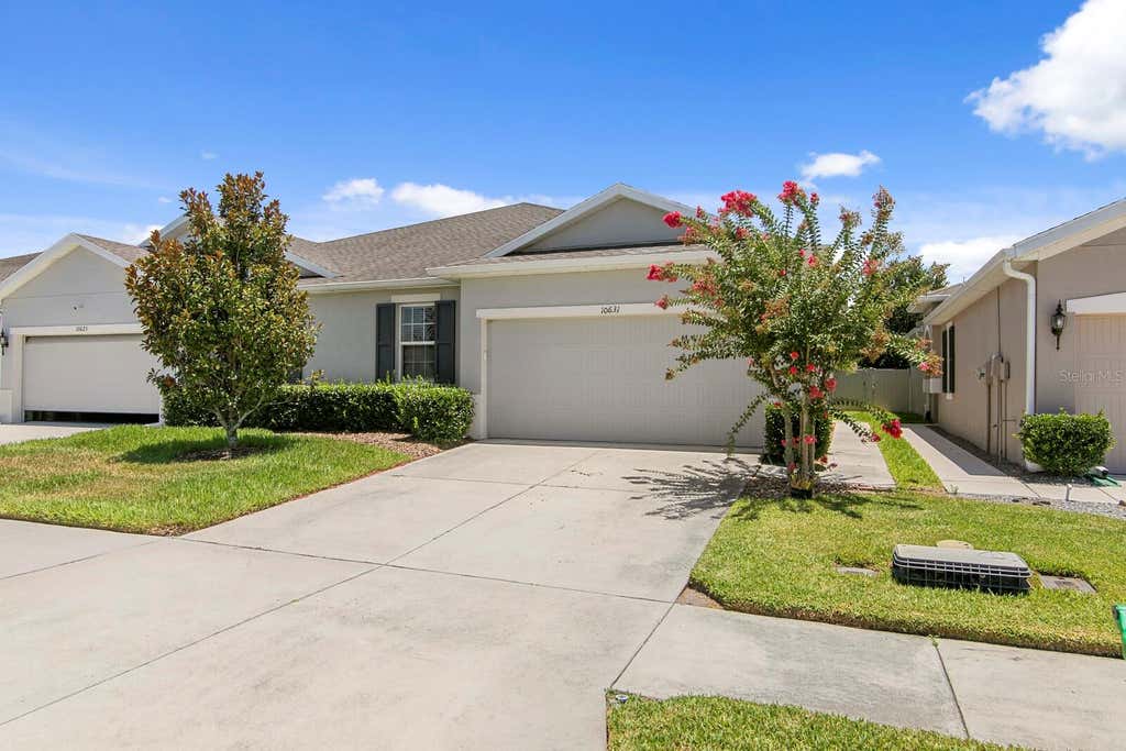 Photo of 10631 Heron Hideaway Loop, Land O Lakes, FL 34638 (MLS # TB8522335)