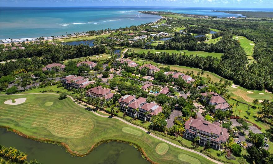 48-hour notice required for all showings. Step into timeless elegance and effortless resort living in this one-of-a-kind ground-floor residence within the exclusive Las Verandas enclave at Bahia Beach Resort. The only unit of its caliber currently on the market, this home showcases a full-scale, designer-led renovation that brings together elevated finishes, refined craftsmanship, and a modern design sensibility rarely found. Spanning approximately 2,765 square feet, the three-bedroom, three-bathroom layout has been thoughtfully reimagined with luxurious materials and a serene, sophisticated palette throughout. The open-concept living and dining area flows seamlessly into a show-stopping chef’s kitchen; sleek cabinetry and golden accents create a space equally suited for everyday living and effortless entertaining. Floor-to-ceiling glass doors open to a well-appointed covered terrace with a dedicated BBQ and dining area, all overlooking Bahia’s manicured golf course and lush tropical landscaping. The primary suite is a true retreat, featuring a spa-style bathroom with a freestanding soaking tub, dual vanities, and gold-trimmed fixtures that echo the home’s refined glamour. Two additional bedrooms and baths provide comfort and privacy for family or guests. Ownership at Las Verandas offers the opportunity to become a member of the Bahia Beach Resort & Golf Club, unlocking access to a curated collection of world-class amenities including the St.Regis Bahia Beach Resort, Robert Trent Jones Jr. golf course, beach club, tennis courts, nature trails, and concierge services, all within the only certified Gold Audubon Signature Sanctuary in the Caribbean. Whether you're seeking a primary residence, a tranquil getaway, or an investment property, this rare offering blends impeccable design with the relaxed sophistication of Puerto Rico’s most coveted coastal address.