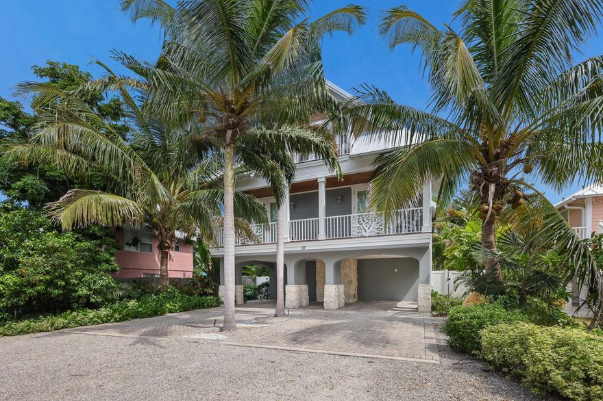 Nestled just a short stroll from the sugary white sands of the Gulf of Mexico, Coral Kai offers the quintessential coastal living experience. This almost brand new, Ross Custom Built pool home offers luxurious living space featuring high ceilings and an open-concept design that seamlessly blends the kitchen, family room, and dining space. Plank wood ceilings adorn this expansive area, creating a warm and inviting atmosphere. The kitchen is a chef's dream, featuring a large island with seating for four, quartz countertops, stainless steel appliances, soft-close cabinetry, and a full-sized butler’s pantry. The glass tile backsplash adds a touch of elegance to this modern space.

The spacious owner's ensuite is a dream retreat, with balcony access and a bathroom boasting a double vanity and a glass-enclosed tile shower. The second bedroom upstairs offers ample storage, balcony access (where the sea breeze can be your daily companion) and convenient access to the second bathroom. The third ensuite bedroom is bright and airy and comes with a spa-like bathroom that includes a walk-in shower. A delightful perk for visiting guests is the third-floor coffee bar and beverage station. You’ll marvel at the fabulous outdoor living space with an expansive covered patio, sparkling pool, sun shelf, and spa. Enjoy games and snacks in the downstairs game room. Throughout the home, 8-foot solid 5-panel doors, plank tile floors, crown molding, and recessed LED lighting exude sophistication and charm along with an elevator and washer and dryer for convenience.

This coastal haven offers access to all 7 miles of Anna Maria Island (via a free trolley) making it a true beach lover’s paradise. Coral Kai represents more than a home, it’s a lifestyle.