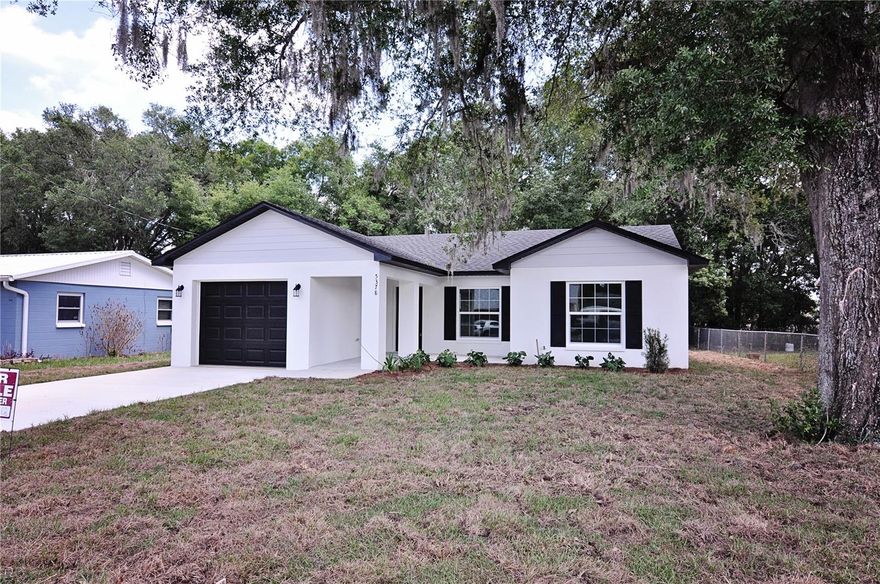 Welcome to your brand-new home in the heart of Zephyrhills! This beautifully constructed 3-bedroom, 2-bathroom residence with a 1-car garage offers the perfect blend of modern design, comfort, and convenience. As new construction, this home provides peace of mind with updated systems, energy efficiency, and a fresh, move-in-ready interior designed for today’s lifestyle.

Ideally located at 5738 Tangerine Drive, this property is nestled in a growing area known for its small-town charm with easy access to larger city amenities. Zephyrhills offers a welcoming, community-focused atmosphere with a variety of housing options and a steadily expanding residential footprint.  A community park with a playground is just a block's walk away, right beside the public golf course! 

Residents enjoy close proximity to local parks and outdoor recreation, including nearby destinations like Zephyr Park, which features walking trails, playgrounds, and scenic green space perfect for enjoying Florida’s year-round sunshine and Zephyrhills Skate Park - perfect for the adventure seeker. The area also provides convenient access to shopping, dining, schools, and everyday essentials, with additional entertainment, medical facilities, and major retail centers just a short drive away.

For those commuting or seeking more extensive amenities, the home is ideally positioned within reach of the greater Tampa Bay area, offering access to arterial roadways, major attractions, employment centers, and world-class entertainment—all while maintaining the affordability and relaxed pace that make Zephyrhills so desirable.

Whether you’re a first-time buyer, downsizing, or simply looking for a low-maintenance, new construction home in a growing community, this property delivers exceptional value and lifestyle.