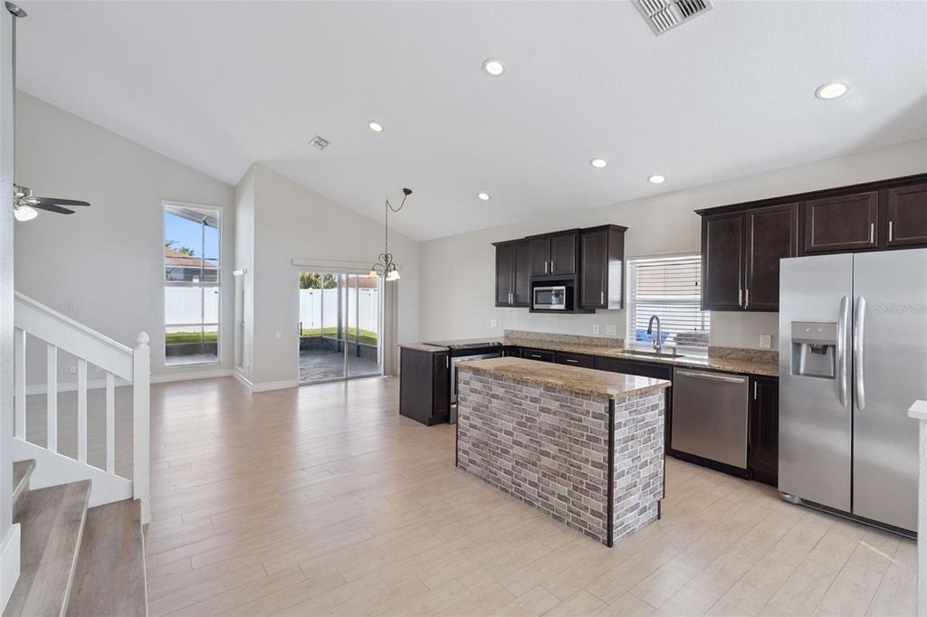 Photo of 3284 Falcon Point Drive, Kissimmee, FL 34741 (MLS # O6357344)