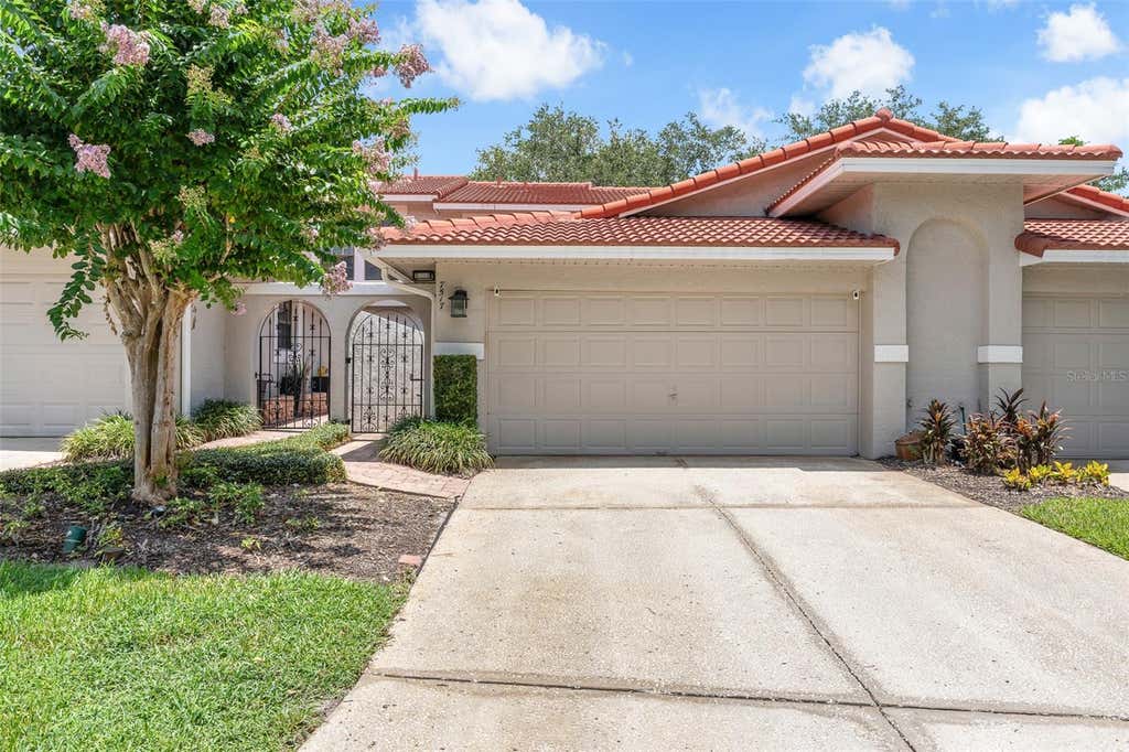 Photo of 7517 Fenwick Cove Lane, Orlando, FL 32819 (MLS # O6419830)