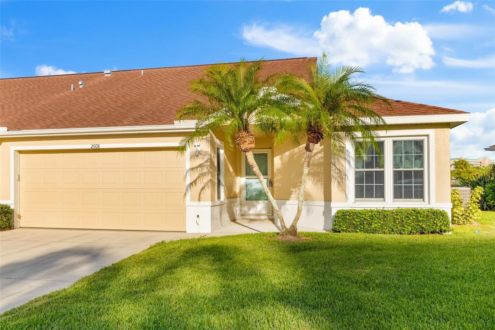 One or more photo(s) has been virtually staged. Discover the perfect balance of comfort and tranquility in this beautifully maintained waterfront 2-bedroom, 2-bathroom villa behind the gates of the desired Golf and Tennis Club of Terra Ceia Bay. Tucked away in a serene setting with incredible views, this home invites you to enjoy a lifestyle that feels like a retreat while still being minutes from everyday conveniences. Step inside and be greeted by an open, light-filled floor plan with high vaulted ceilings designed for both relaxation and entertaining. The spacious tiled living room flows seamlessly into the dining area and kitchen, making it great for entertaining. The kitchen has amble storage and counter space with room for seating. Large upgraded hurricane windows frame peaceful water views, filling the home with natural light and highlighting the lush surroundings. Enclosed lanai creating extra space throughout. The private primary suite offers a calm retreat of its own, complete with an en-suite bath, tile shower, dual sinks and walk-in closet. A second bedroom and full bathroom provide flexibility for guests, a home office, or a cozy reading nook. Oversized 2 car garage for all your storage needs. With exterior maintenance free living, you’ll have more time to enjoy the things you love, whether that’s exploring nearby shopping and dining, taking in the area’s natural beauty, or simply relaxing in the comfort of your own home. Ownership includes cable and internet services, lawn care, and the building exterior. The community offers a very scenic locale, and is located within Terra Ceia Bay Club in Palmetto, where residents can elect to enjoy access to golf, a full-service restaurant, pool, pickleball, tennis, walking paths, and a dock on Terra Celia Bay. Call today for your private showing.