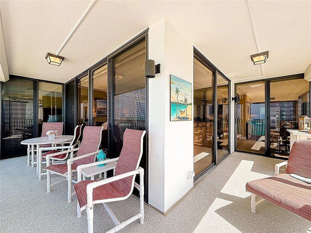 Photo of 7100 Sunset Way #801, St Pete Beach, FL 33706 (MLS # O6390457)