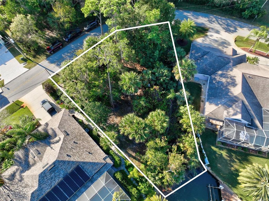 Photo of 27 Colechester Lane, Palm Coast, FL 32137 (MLS # FC314612)