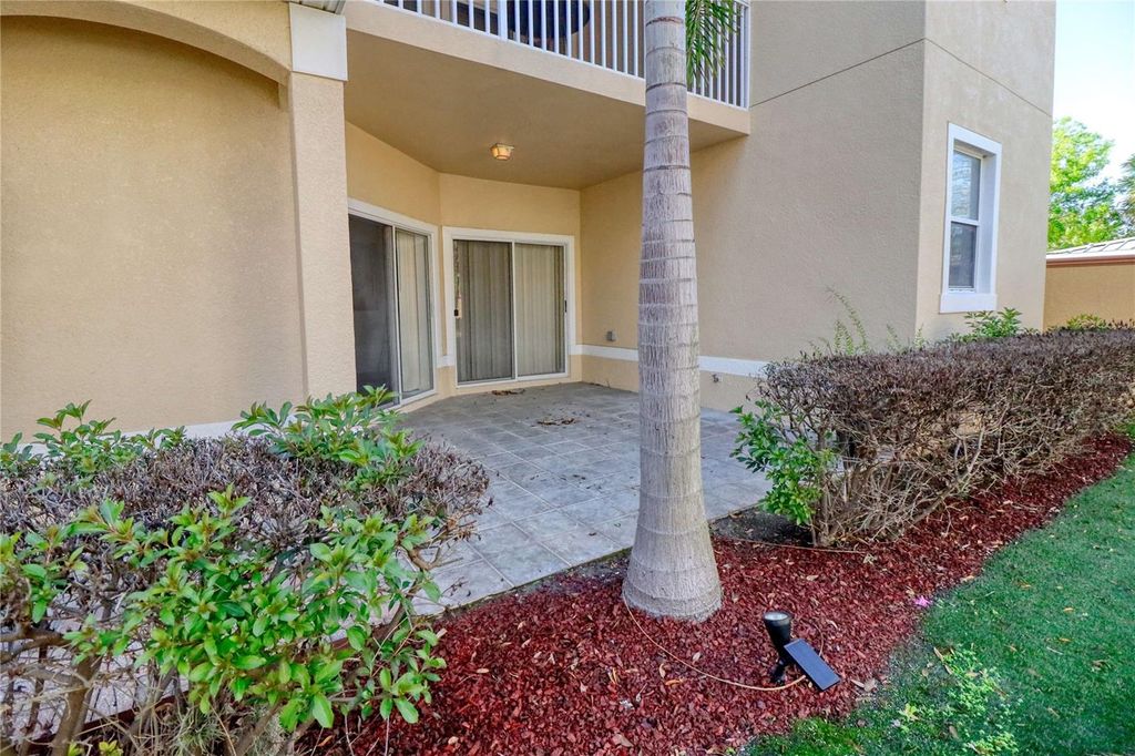 Photo of 21019 Sunpoint Way #102, Lutz, FL 33558 (MLS # A4686922)