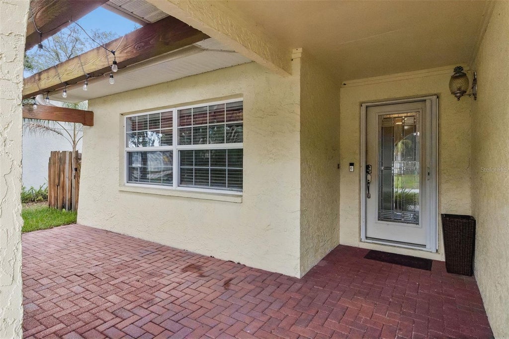 Photo of 11606 Painted Hills Lane, Tampa, FL 33624 (MLS # O6431117)