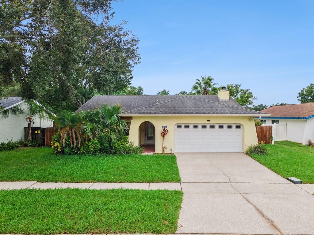 Photo of 11606 Painted Hills Lane, Tampa, FL 33624 (MLS # O6431117)
