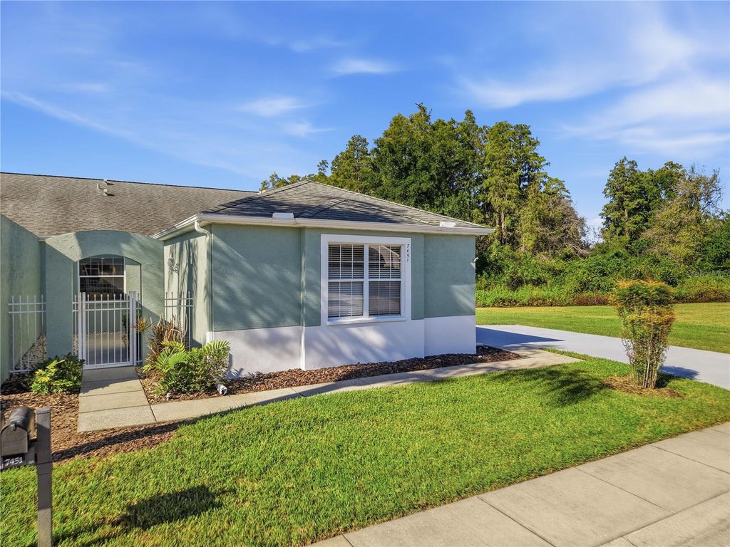 Photo of 7451 Trovita Road, Land O Lakes, FL 34637 (MLS # TB8561575)