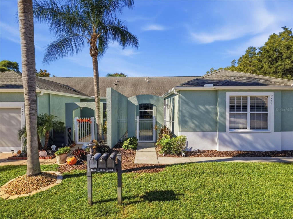 Photo of 7451 Trovita Road, Land O Lakes, FL 34637 (MLS # TB8561575)