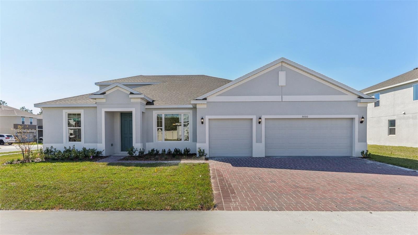 Move-In Ready! Discover the exceptional Brentwood plan in the highly sought-after Bargrove Estates community! This stunning 5-bedroom, 4-bath home with a 3-car garage offers 3,344 sq. ft. of beautifully designed living space, including a versatile second-floor Bonus room / 5th bedroom with a full bath. Located on an oversized corner homesite, this home features high-end upgrades throughout—9'4" ceilings and 8' interior doors on first floor, 5¼" baseboards, window blinds, and more. The well-appointed kitchen is a chef’s dream with 42" cabinets with crown molding, quartz countertops, a stylish tile backsplash, stainless steel appliances - with gas range, an oversized island, and a spacious walk-in pantry. The luxurious primary suite includes a spa-like bath with dual sinks in adult-height vanity, a garden tub, a walk-in shower with frameless glass enclosure, and a large walk-in closet. Enjoy indoor-outdoor living with a spacious Great Room that opens to a covered rear lanai—perfect for relaxing or entertaining. This fantastic home is located in the quaint community of Bargrove Estates located just a few minutes from historic downtown Mount Dora. Shopping, restaurants and movie theater are all within easy access so you can enjoy the charm of living in a small community without forfeiting convenience.