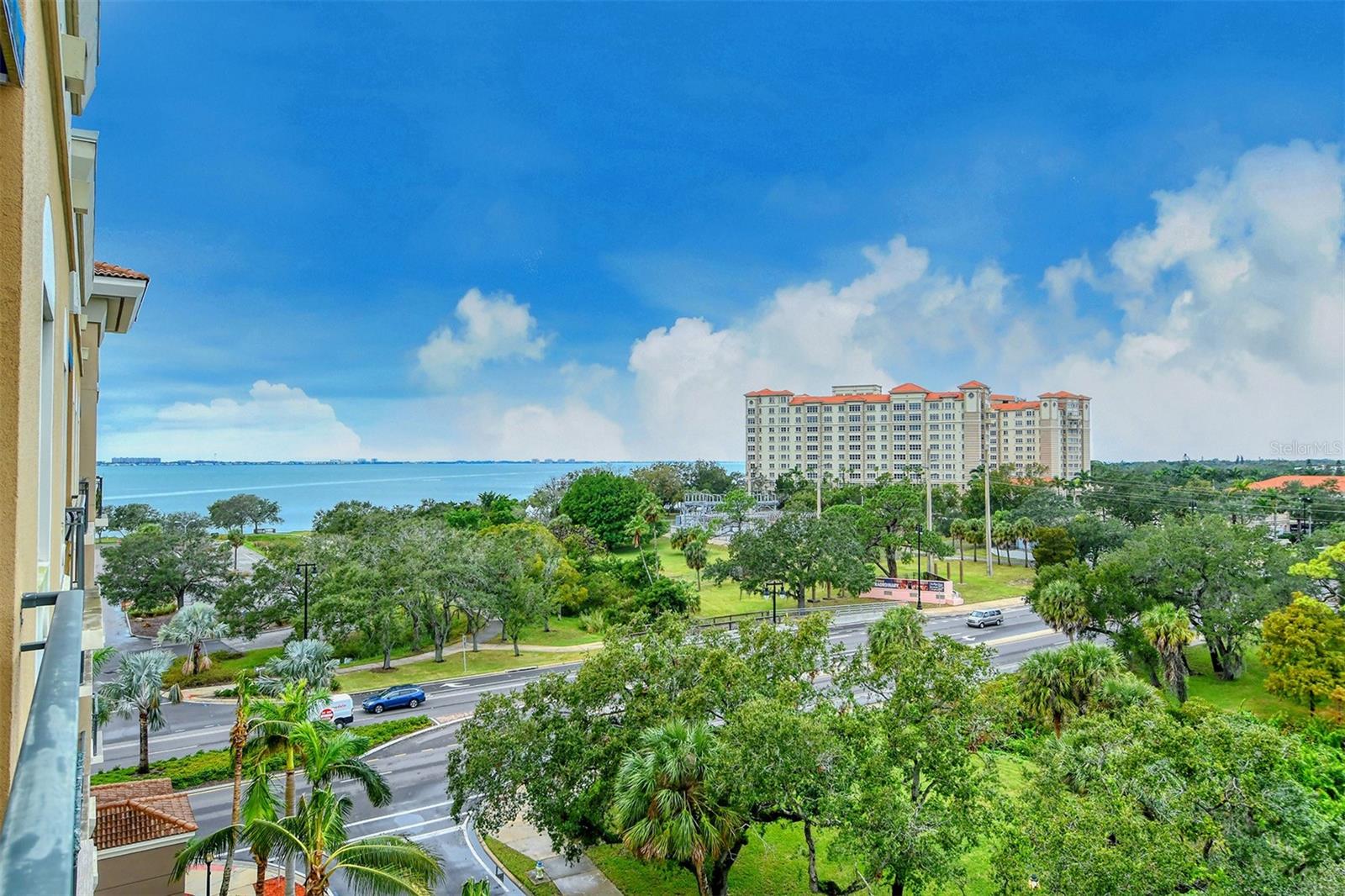 DOWNTOWN CONDO IN BROADWAY PROMENADE! NOW AVAILABLE FOR ANNUAL RENTAL, “Turnkey Furnished” 2 bedrooms/2 baths, located on the top floor of the highly sought after Broadway Promenade. As you enter the unit, you are greeted by a bright and open living and dining room, beautifully furnished with leather furniture, a wooden TV Stand/Console with Electric Fireplace and Crystal Insert | Multi-Color LED Flame | Remote Control | Adjustable Heat Settings and crown molding throughout. The fully equipped kitchen with ceramic tile flooring has a breakfast bar with bar stools, stainless steel appliances and granite counters, master suite with queen size bed, en-suite bathroom, walk in shower and separate oversized garden tub, granite countertops, solid wood cabinetry, and linen closet and sliding glass doors leading out to the private covered balcony with high top table and two chairs where you can sit and enjoy the views of Sarasota Bay and Pioneer Park, or take in the breathtaking sunsets every evening. The guest bedroom is on the other end of the unit with a queen bed, separate guest bathroom with tub/shower, and laundry closet with full-size washer and dryer. Broadway Promenade offers many amenities, including 24-hour concierge and reception services, a spacious lobby, elevator, two social rooms, fitness center with locker rooms and a dry sauna, heated outdoor pool and spa, grilling area, billiards and card room, a library/study room. Conveniently located a few blocks away from Downtown Sarasota, shopping, dining, entertainment, Van Wetzel, St Armand’s Circle, and Lido Beach. Take a scenic walk over the Ringling Bridge to Bird Key/St. Armand’s Circle. No pets allowed HOA/Owner rules.