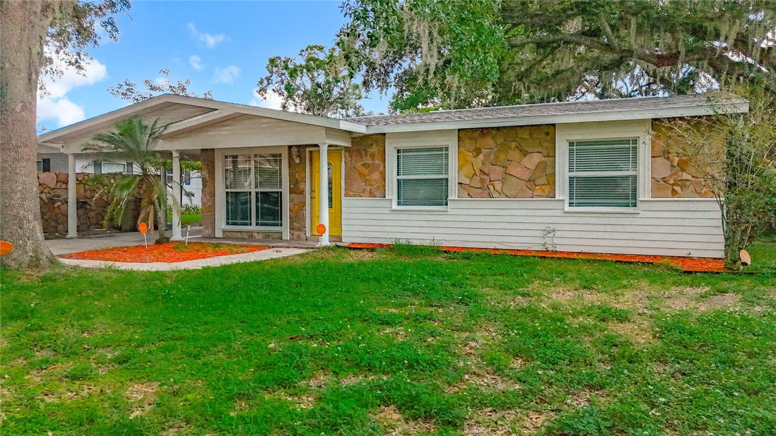 Discover this beautifully renovated 4-bedroom, 2-bathroom home in a Gulf cart community in Tempe Terrace, featuring NO HOA and NO CDD. The open floor plan seamlessly integrates the living room, dining area, and kitchen, perfect for everyday living and entertaining. The kitchen is equipped with brand-new stainless steel appliances, sleek cabinetry, quartz countertops, and a large island with eating space, ideal for casual meals and gathering. The primary suite offers a serene retreat, complete with a generously sized bedroom and a trendy ensuite bathroom. Three airy guest bedrooms and a modern guest bathroom create a comfortable layout on the opposite side of the home. Additional highlights include a brand-new roof (2025), AC (2023), and a 2019 water heater. The spacious backyard features a storage shed, perfect for tools or hobbies. Located near Bush Garden, Hard Rock, Downtown, and USF, and within walking distance to groceries (Winn-Dixie and Publix), restaurants, golf course, and the Hillsborough River. Don't miss this opportunity to own this beautiful home!