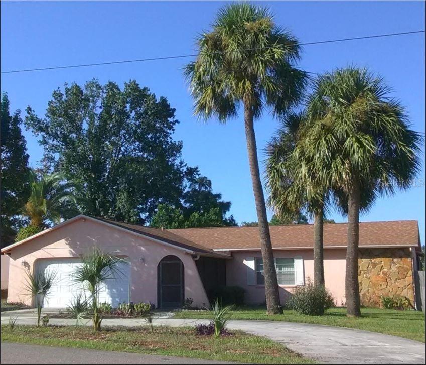 CASH ONLY, Unrepaired Sinkhole Home - 2/2/2 POOL HOME located in nice, quiet neighborhood in Spring Hill, Great home or Rental Property, Clean and well kept. Very open and split bedroom floorplan with An Oversize 2 Car Garage with a Circular Driveway that allows for additional parking and nice palm trees in the front yard. There Is A Front Screened Porch Then Enter The Home To The Living Room And Tiled Eat In Kitchen That has A Pantry, Breakfast Bar And Dining Area Then There Is A Family Room- Out Back There is A Covered Screened Porch- Nice Pool Area- Fenced Yard Plus A Separate Fenced Dog Run. No rear neighbors/build behind (retention pond behind backyard)- Extras Include Septic Pumped 2021, New Roof Installed 2014, Newer Pool Pump Timer And Motor 2021, Filter cartridge unit is 2022. New Elements On The Hot Water Heater 2022, AC unit is routinely services and new capacitor installed June 2023, Dishwasher 2019, Stove 2022, Security System 2019, Pool Bath, Exterior Gutters, Ceiling Fans And Interior Paneled Doors- Call Today For A Showing.