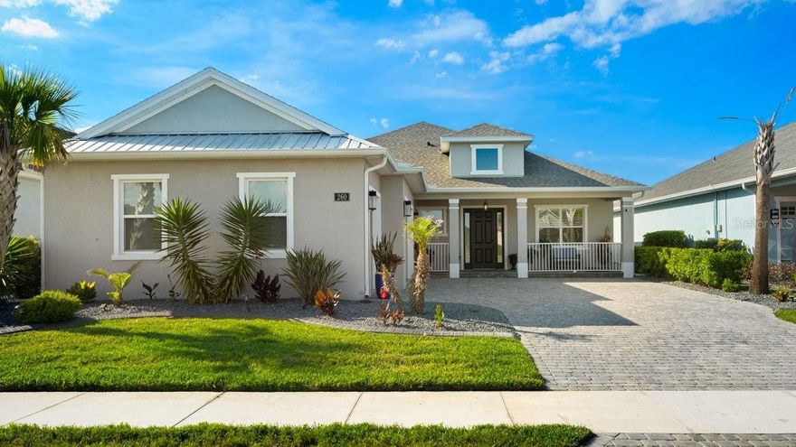 Space, light, and standout design come together in this impressive Mosaic residence that checks every box—and then some. From the moment you step inside, the scale is undeniable: soaring ceilings, a sprawling open layout, plantation shutters and sleek porcelain tile throughout create a clean, elevated feel that’s both modern and inviting.

The heart of the home is built for real living and real entertaining—a wide-open kitchen with custom soft-close cabinetry, granite island, and stainless steel appliances flows effortlessly into an expansive living space. Collapsible sliders with remote blinds frame tranquil pond views and open to an extra-long screened, covered porch, extending your living space outdoors in a way that feels seamless.

This home delivers on flexibility and privacy with a true split plan and multiple ensuite bedrooms, including a secondary suite ideal for guests or multigenerational living. The primary suite is a retreat of its own with coffered ceilings, dual walk-in closets, and a spa-style bath featuring a soaking tub, oversized shower, and elevated finishes.

Additional highlights include 8-foot doors throughout, a spacious indoor laundry room, and an extended 3-car garage with a finished epoxy floor.

Set in the highly sought-after Mosaic community, residents enjoy a vibrant lifestyle with a resort-style pool, playground, walking paths, and regular community events, all just minutes from the beach.

GOLF CART INCLUDED IN THE PURCHASE OF THE HOME!!!!

Homes with this level of space, finish, and value don’t sit—schedule your showing and see why.