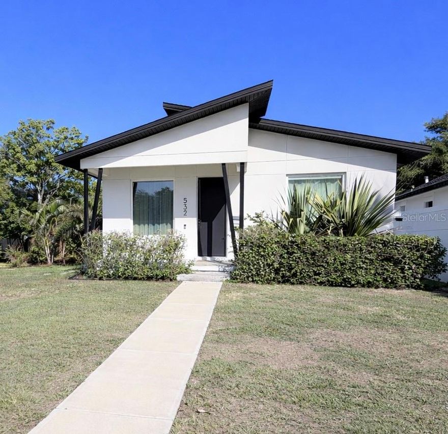 Opportunities like this newer construction Mid-Century Modern home with no HOA are rare in this area of St. Petersburg.
Tucked into one of St. Petersburg’s evolving neighborhoods, this beautifully designed Mid-Century Modern home invites you to slow down, unwind, and enjoy the comfort of modern living.

Built in 2021 by nationally award-winning local builder Kasper Modern, this three-bedroom, two-bath home offers 1548 square feet of thoughtfully designed living space with an open floor plan and attention to detail throughout. Enjoy amenities such as the wine chiller in the kitchen, automatic gate to full fenced in backyard, Located on a corner lot, solar panels, soft water system, and located just two blocks from pinellas trail. The home includes bonus space suite for additional income option to offset mortgage 

Natural light fills the home, highlighting the clean architectural lines and contemporary finishes. The open living, dining, and kitchen spaces flow together seamlessly, creating an inviting atmosphere perfect for everyday living or entertaining guests. Vinyl flooring and ceiling fans throughout enhance both comfort and style.

The kitchen is designed for both function and beauty, featuring solid surface countertops, ample cabinetry, and a full appliance package including a range, microwave, and dishwasher.

A standout feature of the property is the bonus suite, offering flexible space that could easily function as a guest retreat, in-law suite, home office, studio, or additional living space depending on your needs.

Step outside to discover a relaxing outdoor retreat featuring a spacious deck and spa. This inviting space is perfect for unwinding under the stars, enjoying quiet evenings, or hosting friends and family for gatherings. The deck creates an extension of the home’s living space and adds to the property’s relaxed Florida lifestyle.

Constructed with durable block exterior construction, stucco finish, slab foundation, and a shingle roof, the home offers both modern design and lasting durability. Additional features include central heating and cooling, electric water heater, vented exhaust fan, thermostat-controlled climate system, underground utilities, and cable availability.

Conveniently located just minutes from downtown St. Petersburg, residents enjoy easy access to waterfront parks, restaurants, shopping, and the Gulf beaches.

Flood Zone X – flood insurance is typically not required by lenders. No HOA.
