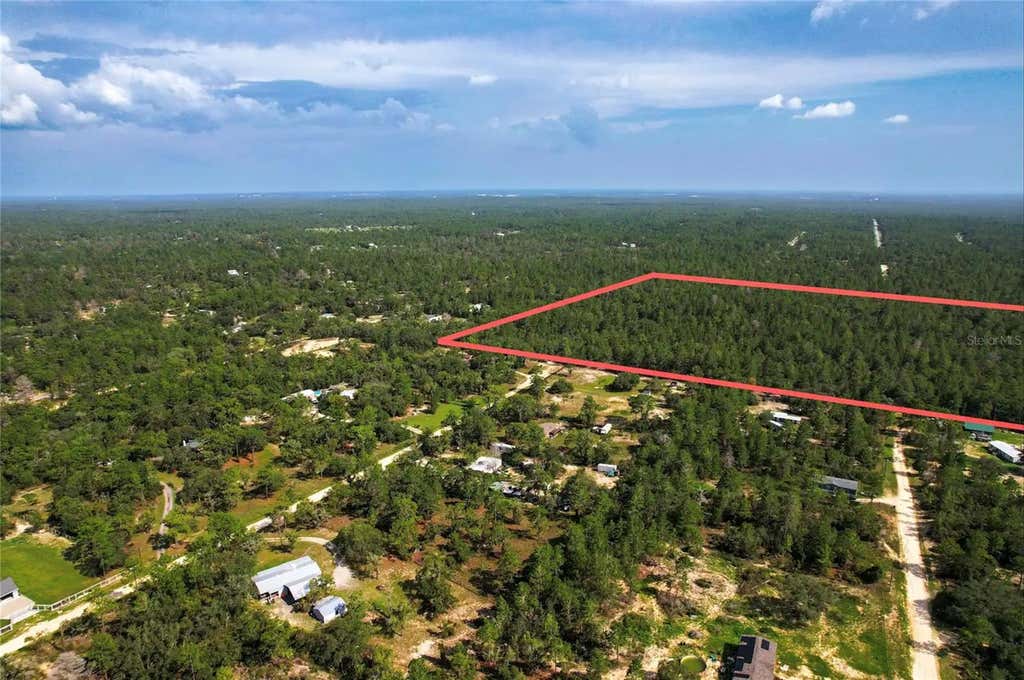 Photo of 6496 N Bernzott Point, Dunnellon, FL 34433 (MLS # O6432992)