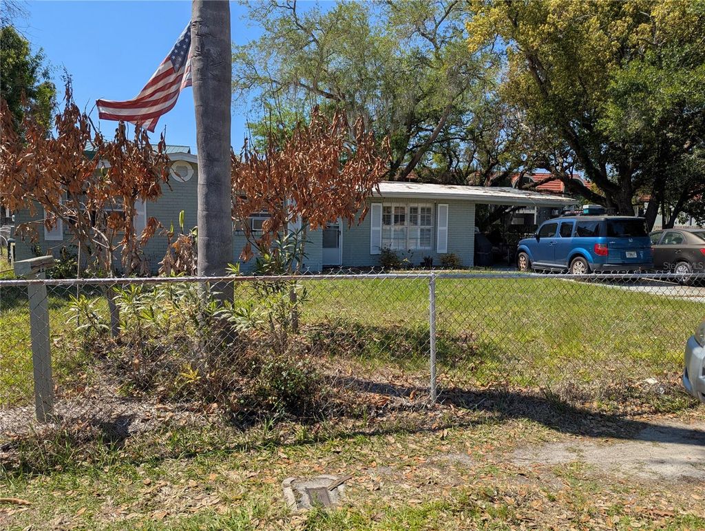 Photo of 8740 N Tangerine Place, Tampa, FL 33617 (MLS # TB8491304)