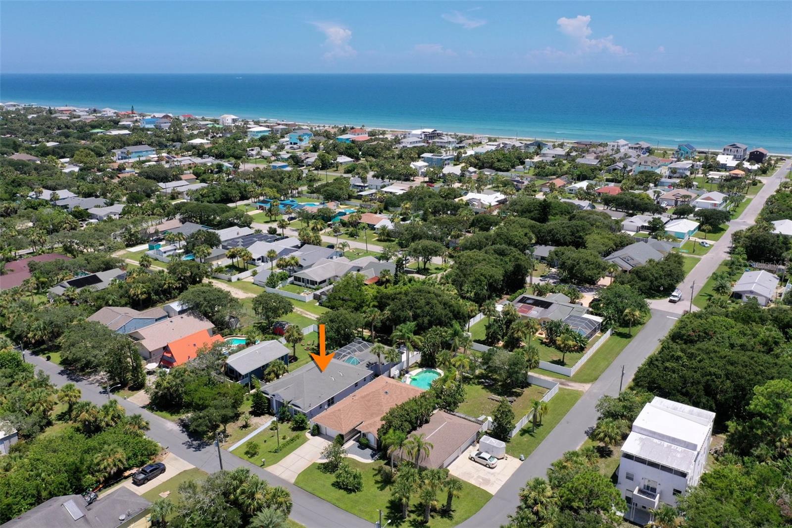 One or more photo(s) has been virtually staged. Some photos (s) have been virtually staged. Located just a short stroll—only four blocks—from the sandy shores of Flagler Beach, this beautifully designed 3-bedroom, 3.5-bathroom home offers 2,170 square feet of thoughtfully crafted living space, blending coastal charm with modern convenience.
Step inside to find tile flooring, high ceilings, and crown molding in the main living areas, creating an airy and elegant atmosphere. The open, split floor plan provides privacy and flow, which is ideal for everyday living or entertaining guests. The spacious living room centers around a cozy gas fireplace, while French doors open into a flexible bonus room—perfect as a home office, playroom, formal dining space, or even a 4th bedroom.
The kitchen is filled with natural light thanks to two skylights and is equipped with granite countertops and a pantry for extra storage. Just off the dining area, sliding glass doors lead to a screened-in patio with a sparkling pool and spa, offering the perfect outdoor retreat.
Each of the three bedrooms features its own en-suite bathroom and walk-in closet, giving everyone their own private space. The primary suite is a true escape, complete with French doors to the patio, his and hers walk-in closets, a soaking tub, a step-in shower, and dual sinks.
Additional highlights include a rear-facing two-car garage with ceiling fans and built-in cabinetry, plus a separate storage room at the back of the home—ideal for beach gear, bikes, or seasonal items.
Enjoy walkable access to the beach, shops, and restaurants, making it easy to embrace the laid-back Flagler Beach lifestyle.
Don't miss the chance to own this versatile and well-appointed coastal home—schedule your private showing of 1935 S Palmetto Ave today!