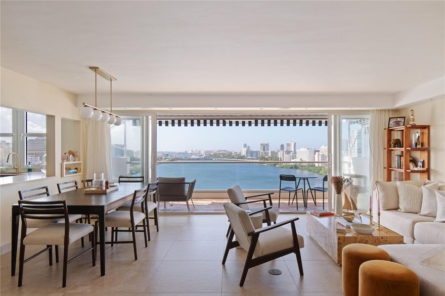 Located in one of San Juan’s most prestigious neighborhoods, Laguna Terrace offers a unique combination of modern living and natural beauty. Situated on the east end of the Condado Lagoon, this residence provides breathtaking views of the water, the ocean, the cruise ship ports, and the historic Old San Juan skyline. Every room in this spacious 1,800+ square foot apartment has been thoughtfully designed to highlight its exceptional surroundings.

The apartment features an open-concept living and dining area that seamlessly connects to a large balcony, ideal for enjoying the gentle sea breeze or the stunning sunsets over the lagoon. The modern kitchen, fully renovated with premium finishes, complements the home’s clean and contemporary design.

The property includes three well-appointed bedrooms and two bathrooms, each offering a bright and serene space. The interior has been recently renovated and furnished with a tasteful aesthetic that balances comfort and sophistication.
Laguna Terrace is not only a residence but also a hub for convenient living, with an array of amenities that enhance the overall experience:
• A pool for relaxation and recreation.
• A fully equipped gym for maintaining an active lifestyle.
• Guest parking to accommodate visitors with ease.
• Full backup generator and water cistern, ensuring uninterrupted functionality and peace of mind.

The property’s location is one of its most distinguished features. Nestled in the heart of Condado, Laguna Terrace is just steps away from La Ventana al Mar, the Condado Lagoon, and renowned establishments such as the Vanderbilt and La Concha hotels. The area is surrounded by premier dining, entertainment venues, green spaces, and outdoor activities. Additionally, it offers convenient access to private marinas, the Isla Grande Regional Airport, and the Distrito T-Mobile entertainment district.

Laguna Terrace is designed for those seeking a refined lifestyle that combines the tranquility of coastal living with the energy and convenience of an urban setting. Its prime location, exceptional views, and modern amenities make it a remarkable property in one of Puerto Rico’s most desirable neighborhoods.