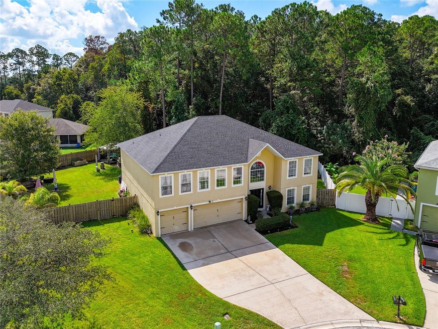 Prepare to fall head over heels for this breathtaking five-bedroom, four-and-a-half-bathroom masterpiece spanning an impressive 3,896 square feet of pure domestic bliss. This stunning residence isn't just a home—it's where memories are born and dreams take flight. With interest in this extraordinary property already building, now is the moment to make your move.

     The heart of this captivating dwelling reveals an open floor plan that flows seamlessly into an expansive family room, crowned by a show-stopping tiki bar that practically begs you to host unforgettable gatherings. Imagine sixty of your closest friends celebrating life’s biggest moments while you play effortless host in this one-of-a-kind entertainment paradise.  The massive kitchen—a culinary cathedral of epic proportions—features gleaming granite countertops adorning an expansive island, creating the perfect stage for game-day spreads, holiday feasts, and spontaneous celebrations. Abundant cabinetry ensures every serving platter and party essential finds its perfect home.

Ascend to discover luxury vinyl plank flooring guiding you through the upper level, where a sprawling loft awaits your creative vision. The palatial primary bedroom, complemented by his and hers walk-in closets and a double vanity, offers a private retreat of uncompromising luxury.

Step outside where the magic continues on the huge walkable deck and screened lanai. The enchanting gazebo, elegantly illuminated, transforms outdoor entertaining into pure art. The generous backyard offers endless possibilities, including space for your future aquatic oasis. A three-car garage and expansive driveway handle every practical need.

Ideally positioned minutes from major interstates for effortless commuting, with River City Marketplace and excellent schools nearby, this extraordinary sanctuary awaits the family ready to live large.

Don't let this rare opportunity slip away—homes like this don't linger. Contact us today to schedule your private showing and discover why this could be where your family's next chapter begins.
All information deemed reliable but not guaranteed.